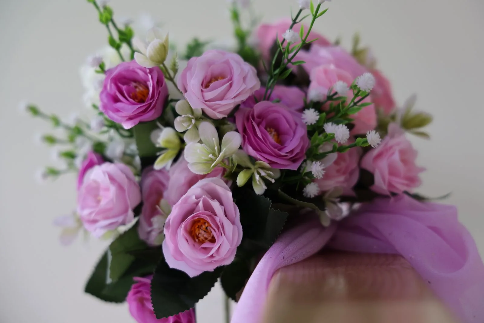 Bridal bouquet with white and blush roses by Bloom & Briar